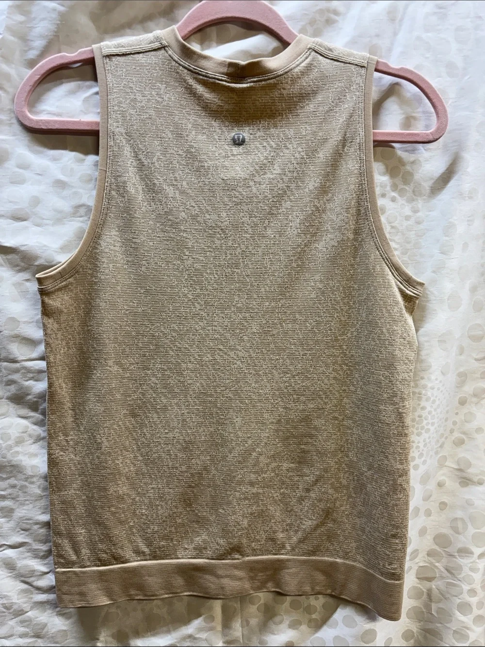 Lululemon Swiftly Breathe Muscle Tank in a metallic beige - size 4